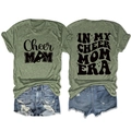 Detailed front and back view of green Cheer Mom Era printed t-shirt with denim shorts - Olive Green (Black Font)