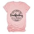 Close-up of minimalist pink cotton T-shirt featuring LET'S KEEP THE Dumbfuckery printed slogan - Pink (Black Print)