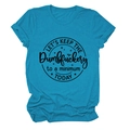 Detailed close-up of blue cotton T-shirt fabric with black circular slogan print - Lake Blue (Black Font)
