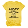 Detail of soft yellow cotton fabric texture and black letter printing on the casual T-shirt - Yellow (Black Font)