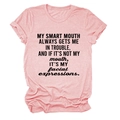 Detail of pink heathered cotton t-shirt featuring bold black slogan and round neckline - Pink (Black Text)