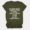 Detail of soft olive green cotton T-shirt showing round neckline and white printed text - Army Green (White Font)