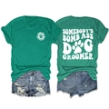 Flat lay of green cotton dog groomer t-shirt and ripped denim shorts outfit set - Dark Green (White Font)