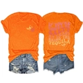 Détails du t-shirt orange avec imprimé vintage salty tequila et short en jean bleu - Orange