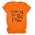 Flat lay of an orange round neck t-shirt featuring OH HONEY I AM THAT MIMI graphic print - Orange (Black Font)