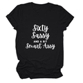 Detail of white Sixty Sassy slogan print on black cotton crewneck t-shirt fabric - Black (White Font)