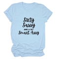 Detail of light blue t-shirt with Sixty Sassy and a Bit Smart Assy black lettering - Light Blue (Black Font)