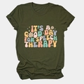 Detailed view of dark olive green T-shirt with vintage speech therapy print and flowers - Army Green