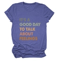 Detail of the high-quality knit texture and retro slogan on this casual navy blue t-shirt - Vintage Blue