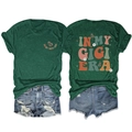 Detailed front and back view of dark green t-shirt with butterflies and In My Gigi Era text - Vintage Green