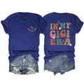 Front and back detail of In My Gigi Era t-shirt with colorful butterfly and floral prints - Vintage Blue