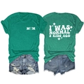 Detail of green M♡M print and I WAS NORMAL 3 KIDS AGO slogan on cotton T-shirt - Dark Green (White Print)