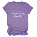 Detailed texture of purple t-shirt with 'tell your dog i said hi' slogan printed on chest - Purple (White Font)
