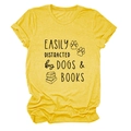 Close-up of yellow cotton t-shirt featuring Dogs and Books graphic print text - Yellow (Black Font)