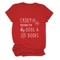 Close-up of red cotton T-shirt featuring easily distracted by dogs and books print - Red (White Font)