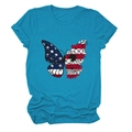 Close-up of butterfly print with floral and US flag patterns on a blue summer t-shirt - Lake Blue