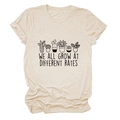 Detail view of cotton T-shirt featuring botanical plant print and inspirational slogan - S / Sand (Black Letters)