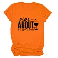 Détail d'un t-shirt orange à col rond avec impression graphique sips about to go down - S / Orange