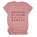 Detail of dusty pink T-shirt featuring a black A-Z letter print and red heartbeat line design - S / Rose Gold (Black Text)