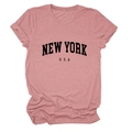 Close-up of New York USA printed text on dusty pink cotton t-shirt with rolled sleeves - Rose Gold (Black Font)