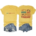Flat lay of mustard yellow T-shirt with vintage floral speech therapy slogan - Yellow