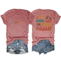 Flat lay of vintage brick red t-shirt with speech therapy slogan and denim shorts - Rose Gold