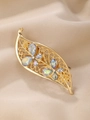 Detail of leaf-shaped gold hair clip with hollow wirework and AB rhinestones - Golden Leaf Flower Style