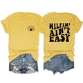 Detailed front and back view of yellow T-shirt with skull hand print and denim shorts - Yellow