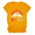 Close-up of vintage rainbow print and open book graphic on ginger cotton T-shirt - S / Tops / Mustard Yellow