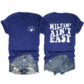 Detail view of Klein blue T-shirt featuring skull hand print and back text graphics - Vintage Blue