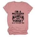 Detail of mauve pink cotton T-shirt showing crew neck and black multitasker text print - Rose Gold (Black Font)