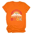 Detail of retro rainbow and book print on a bright orange cotton short sleeve t-shirt - Orange