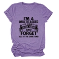 Close-up of purple crew neck T-shirt with black slogan and heathered cotton texture - Purple (Black Print)