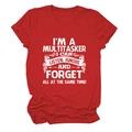 Detailed flat lay of a red cotton T-shirt featuring a white multitasker quote print - Red (White Font)