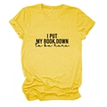 Detail of the 'I PUT MY BOOK DOWN' print on a soft yellow cotton short sleeve T-shirt - S / Yellow (Black Font)