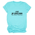 Detail of the slogan print I PUT MY BOOK DOWN on a bright blue cotton t-shirt fabric - S / Deep Water Blue (Black Font)