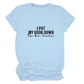 Close-up of I PUT MY BOOK DOWN slogan print on light blue soft cotton casual t-shirt - S / Light Blue (Black Font)