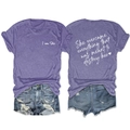 Flat lay of purple 'I am She' short sleeve tee and ripped denim shorts on white background - Purple (White Print)