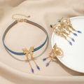 Elegante gouden vlinder sieradenset met blauwe kwastjes inclusief ketting, oorbellen en ring - Ketting Oorbellen Ring 3-Delige Set