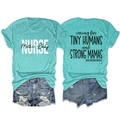 Flat lay of mint green nurse t-shirt with denim shorts showing front and back print - S / Deep Water Blue