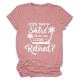 Gros plan de l'imprimé blanc sur T-shirt rose chiné avec motif de palmier et de cocktail - S / Or rose