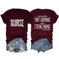 Detail of burgundy nurse t-shirt with dual-side print paired with denim shorts - S / Burgundy