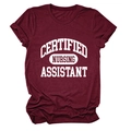 Detailed flat lay of burgundy nursing assistant t-shirt with bold white printed lettering - Wine Red (White Font)