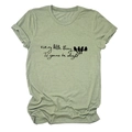 Detailed flat lay of sage green t-shirt with bird print and artistic text - Olive Green (Black Text)