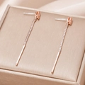 Macro detail of champagne gemstone tassel earrings with rose gold finish and zirconia - Rose Gold Champagne Gemstone Tassel Style (EQ249)
