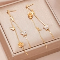 Elegant long gold tassel earrings with rhinestone butterflies and matte roses - Gold Butterfly Rose Tassel Style (EQ256)