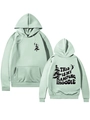 Detail view of mint green camping hoodie featuring ribbed cuffs and forest back print - Light Green
