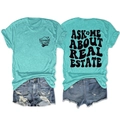 Front and back detail of mint green real estate t-shirt with licensed to sell print - Deep Water Blue (Black Graphic)
