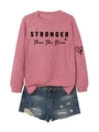 Detail of STRONGER than the Storm slogan and heart print on pink crewneck sweatshirt - Rose Gold (Black Print)
