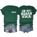 Detail of In My Memaw Era dark green t-shirt with vintage white lettering and denim shorts - Retro Green (White Graphic)